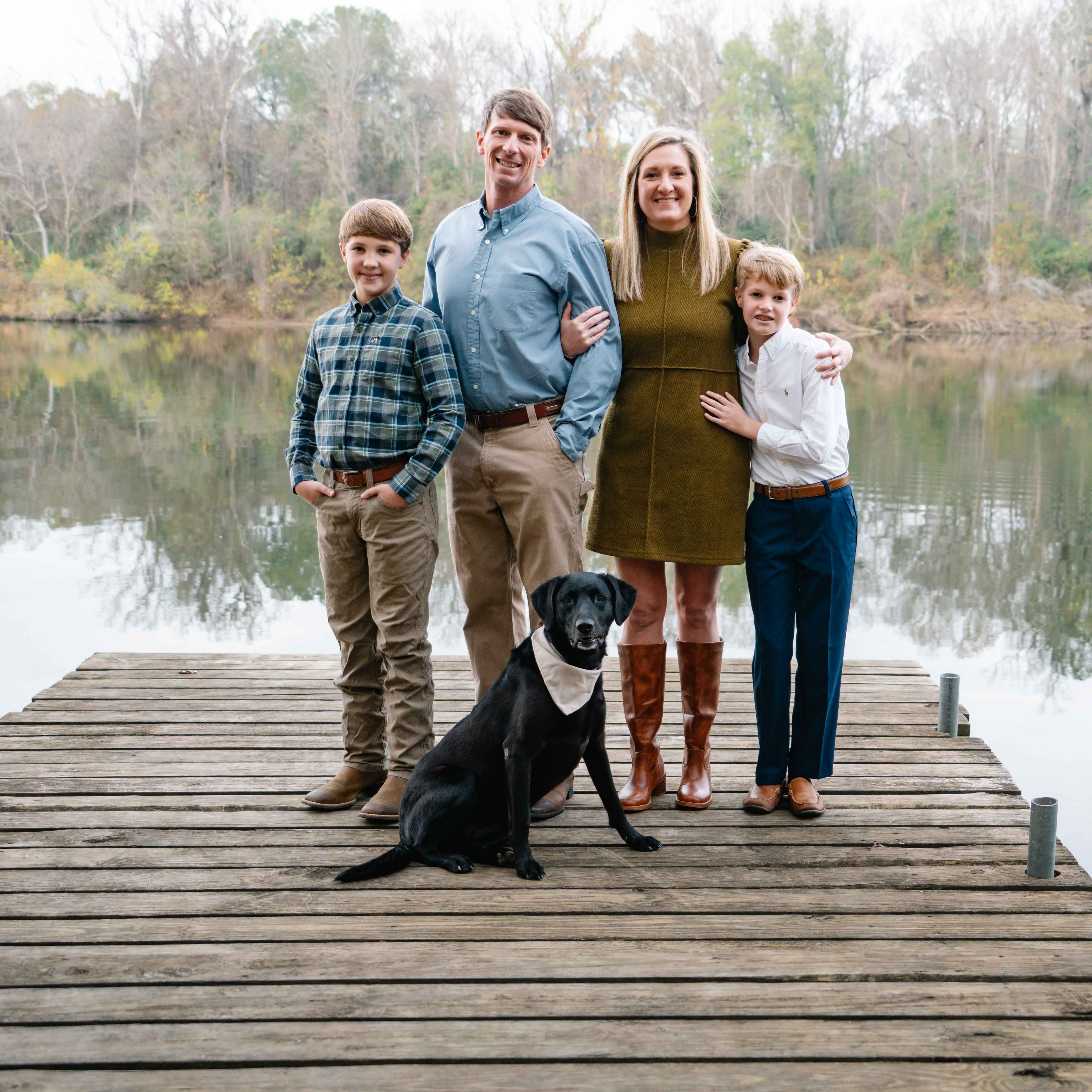 a family standing together in a beautiful setting